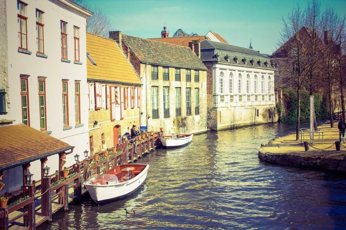 Canal-side street with colourful houses, one of many tours to pick from